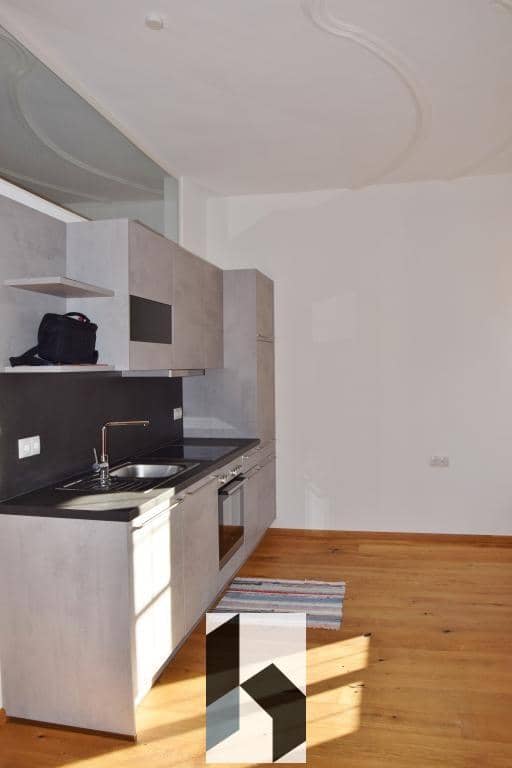 Lichtdurchflutete Wohnung mit Gartennutzung und überdachtem Balkon