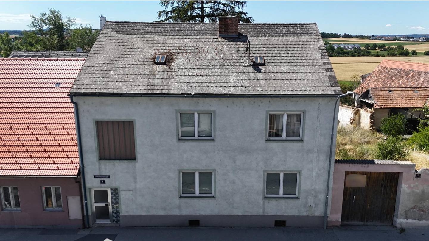 Zentrale familienwohnung mit Terrasse und Garage