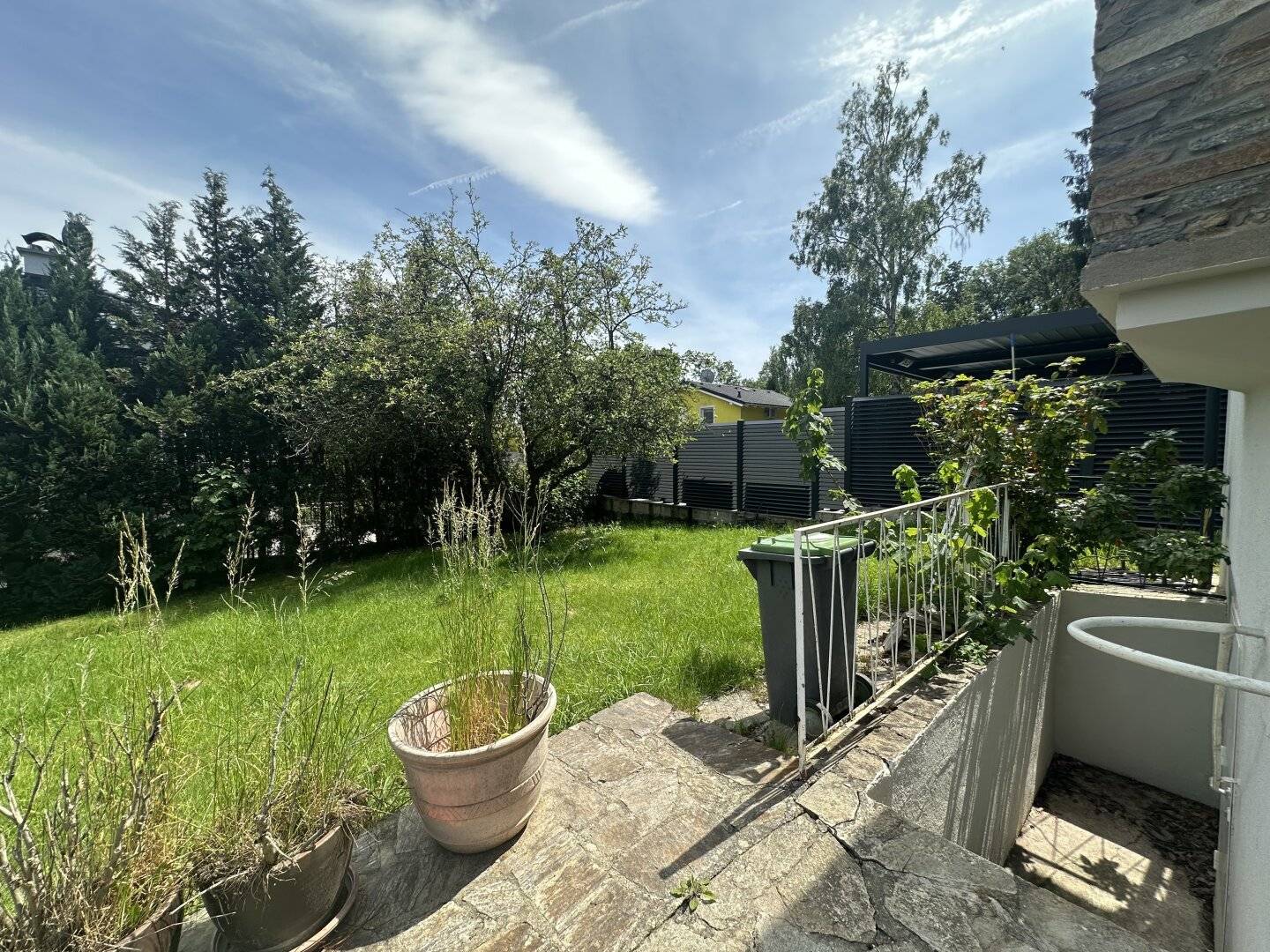 Large garden with small house