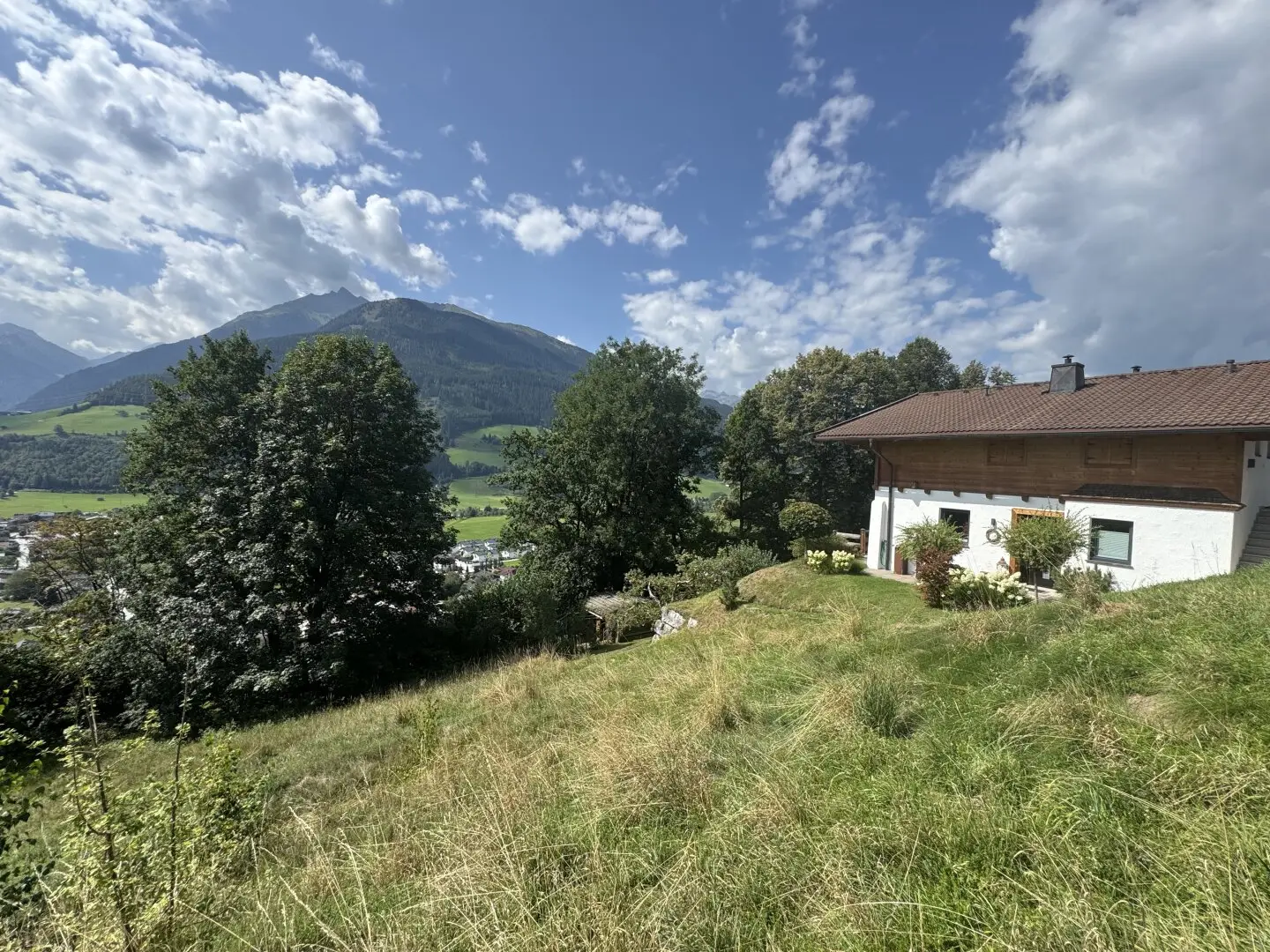 Building plot on the sunny slope with approved building project in Mittersill