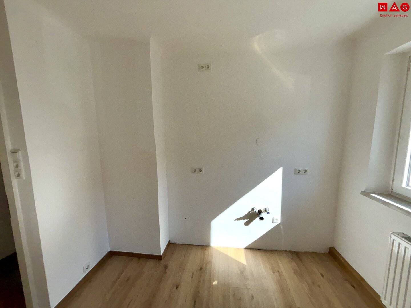 Beautifully renovated ground floor apartment with modern open living kitchen, stylish bathroom and green views in a quiet residential area with excellent infrastructure ideal for small families