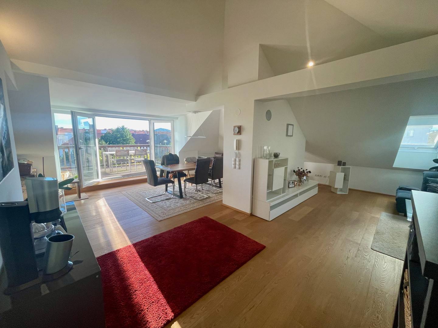 Bright penthouse apartment with roof terrace and garden view