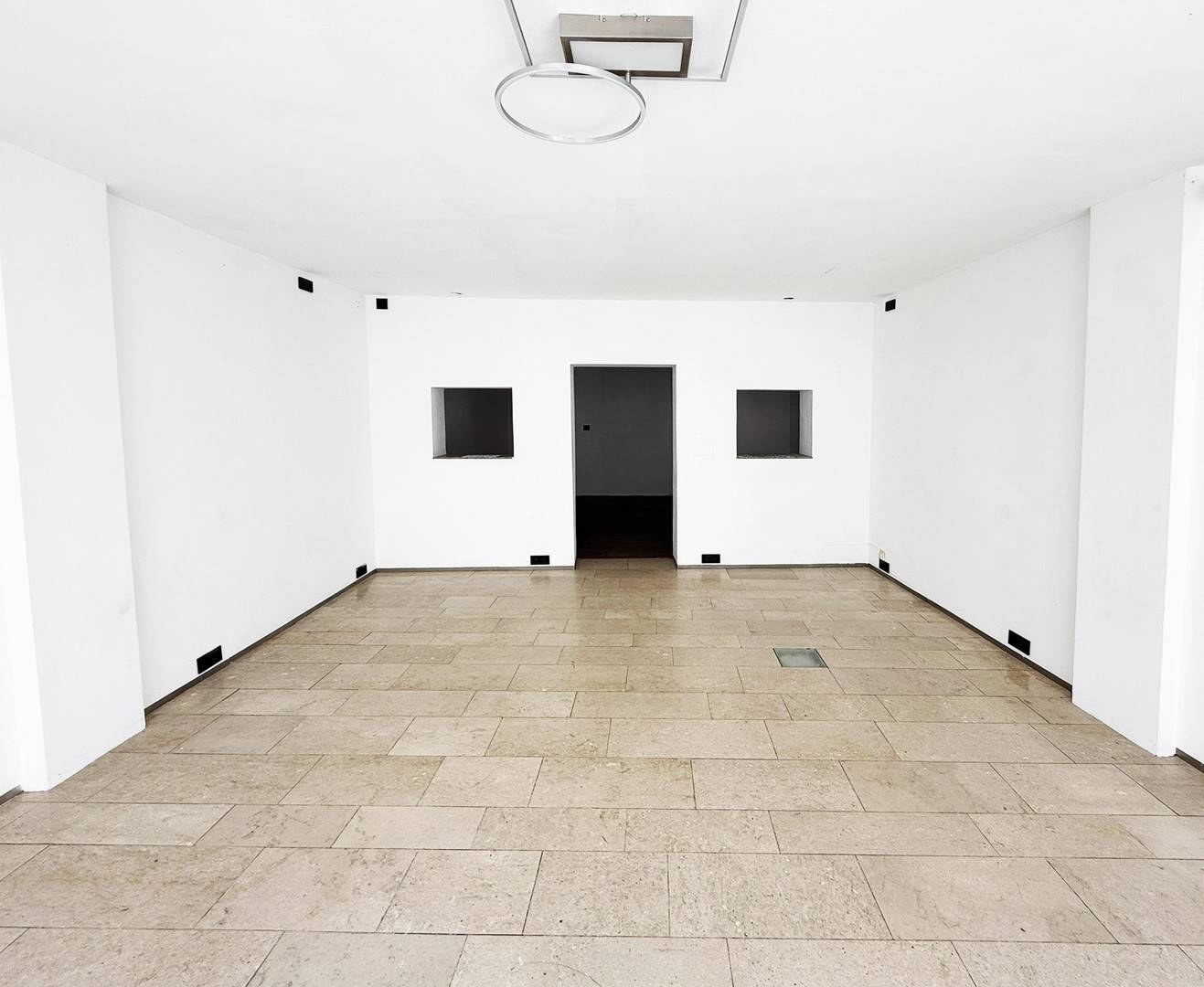 Bright glass front on pedestrian zone apartment