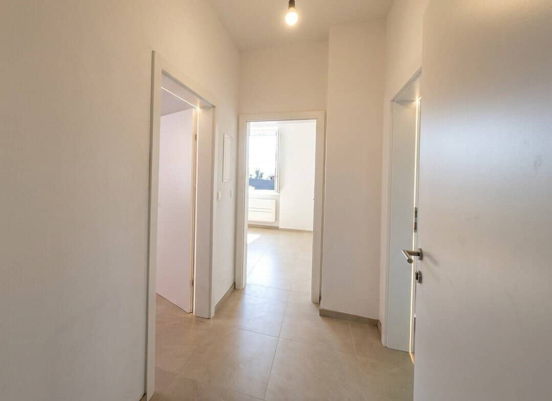 Mietwohnung mit 2 Balkonen, Carport und Parkplatz in zentraler Lage