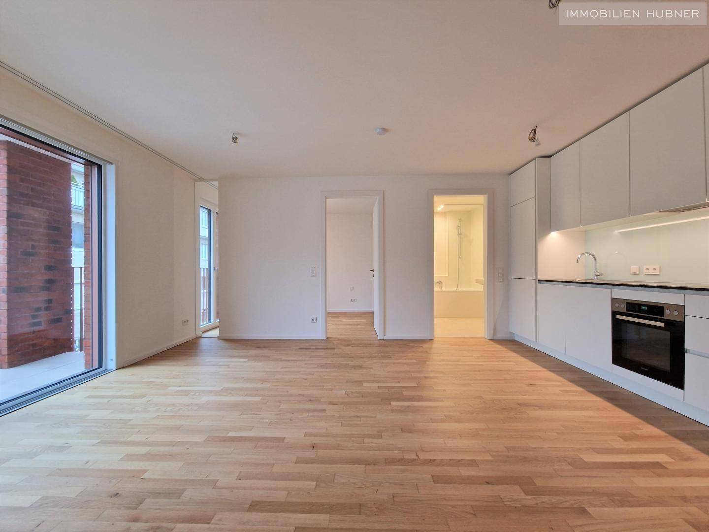 Helle Neubauwohnung mit großem Südbalkon beim Bahnhof Meidling