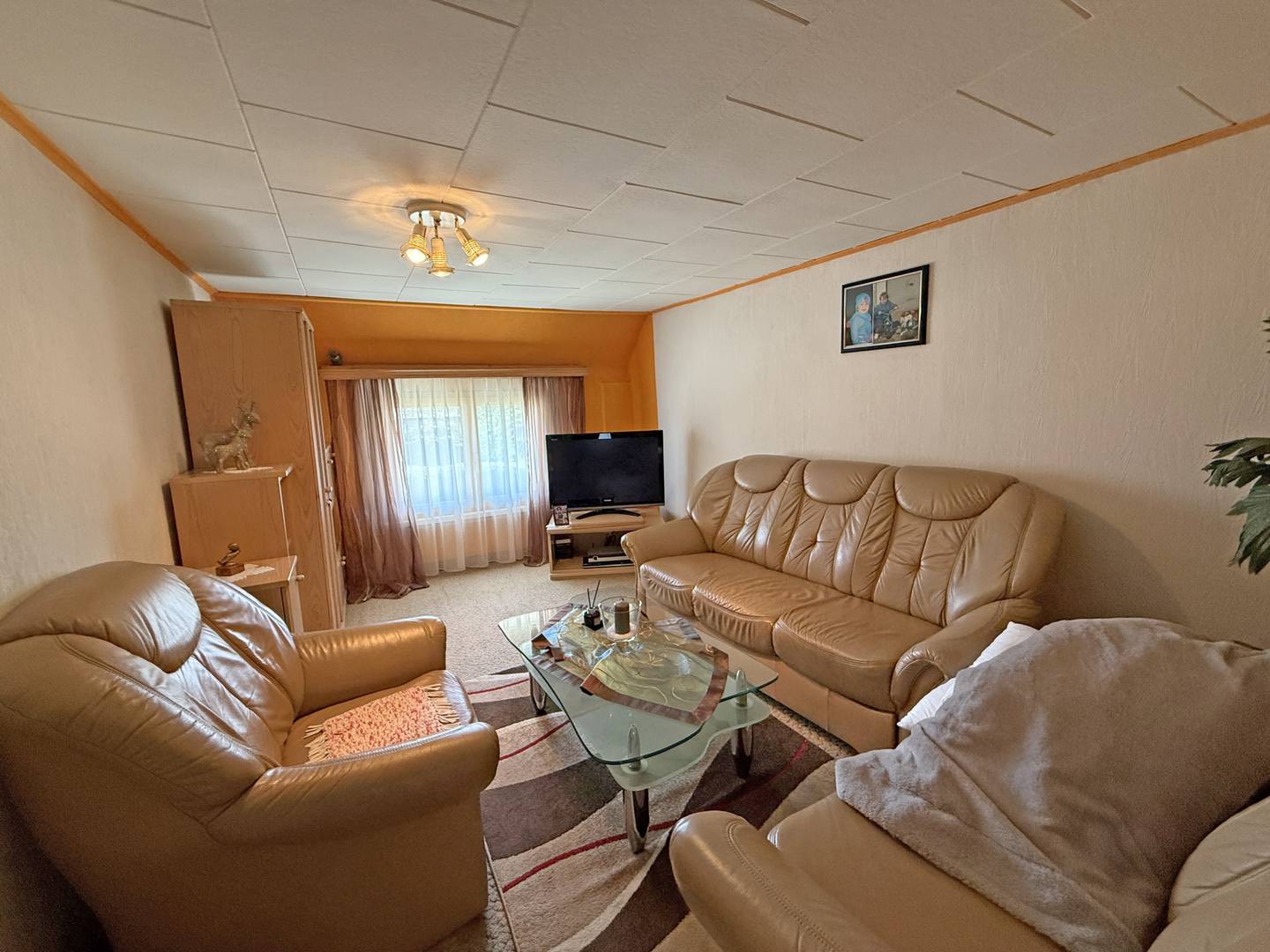 Sonnige Wohnung mit Stadelanbau und Sanierungspotenzial