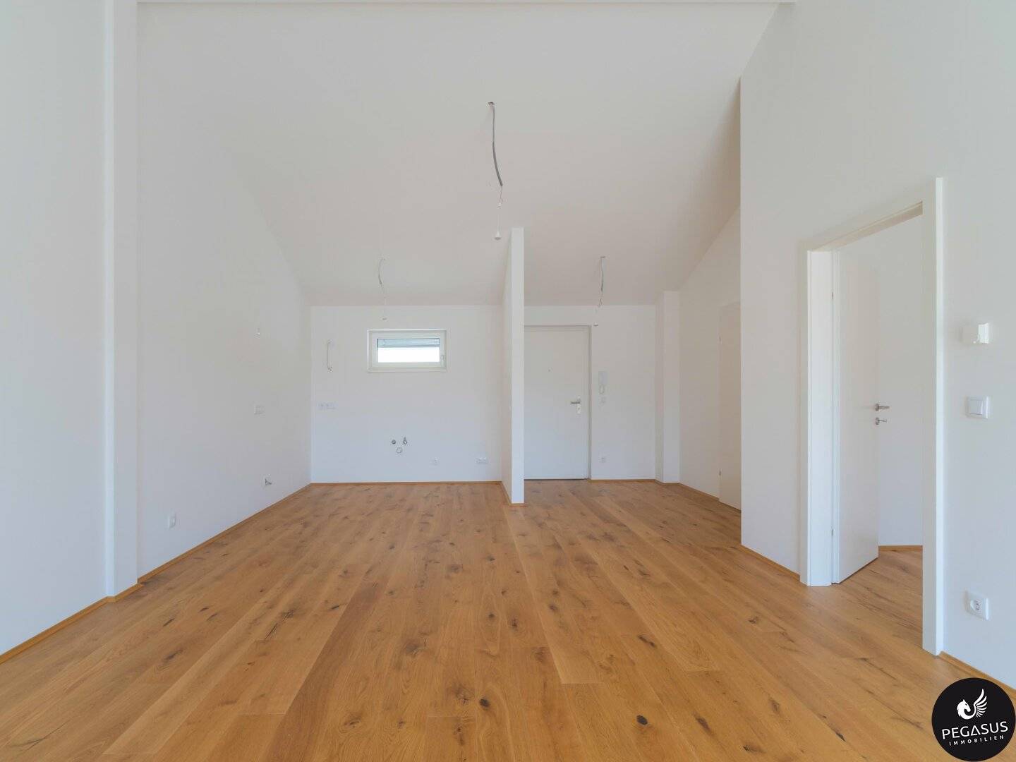 Sunny new build on top floor – 2 rooms, south balcony, elevator