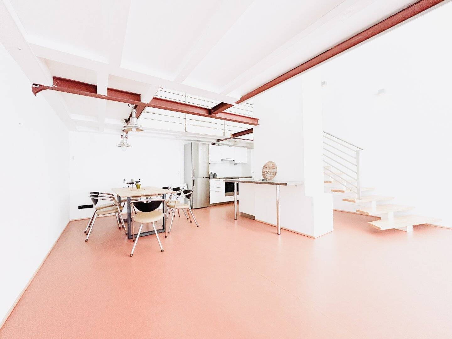 Spacious 4-room loft apartment with gallery level and floor-to-ceiling windows in the 9th District
