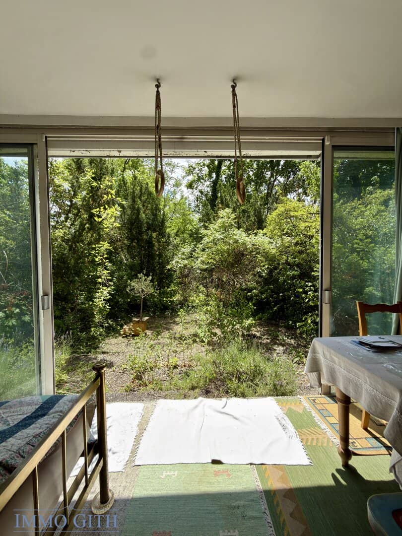 2-room garden apartment with loggia/wintergarden character, generous garden area &amp; garage parking in green quiet location of Baden for sale!