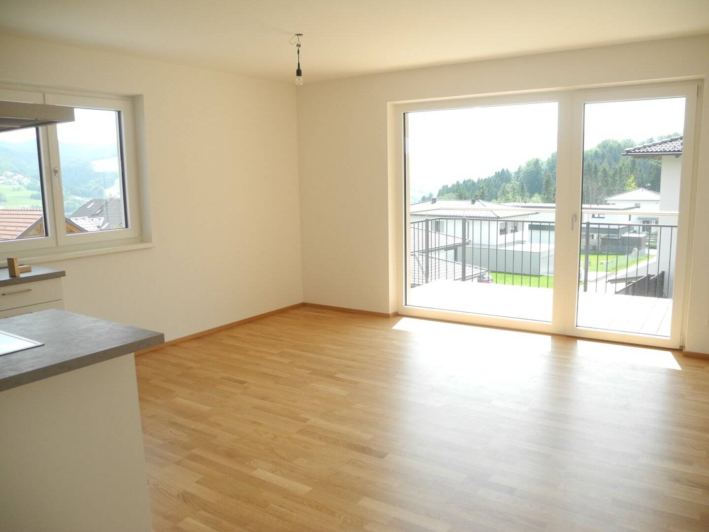 Like-new 3-room rental apartment in Oberwang with Carport and beautiful distant view