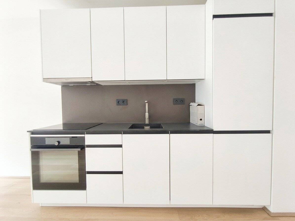 Flat-rate rent including hot water and heating - Modern 2-room apartment with spacious balcony - Stylish fittings