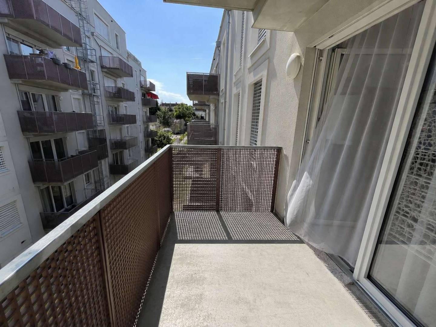 Bright apartment with balcony and efficient ceiling cooling