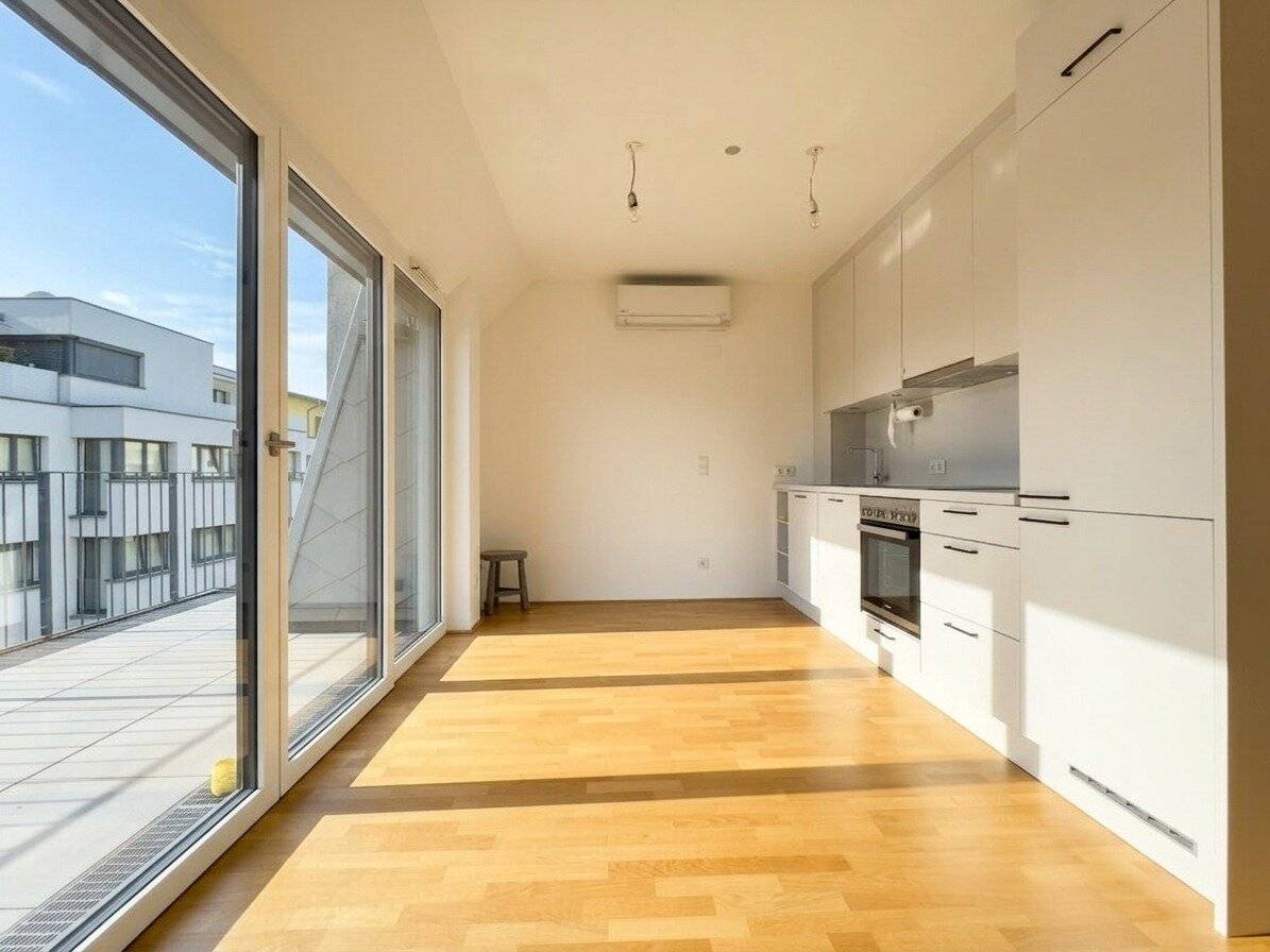 3-room attic apartment in quiet location with spacious terrace and air conditioning