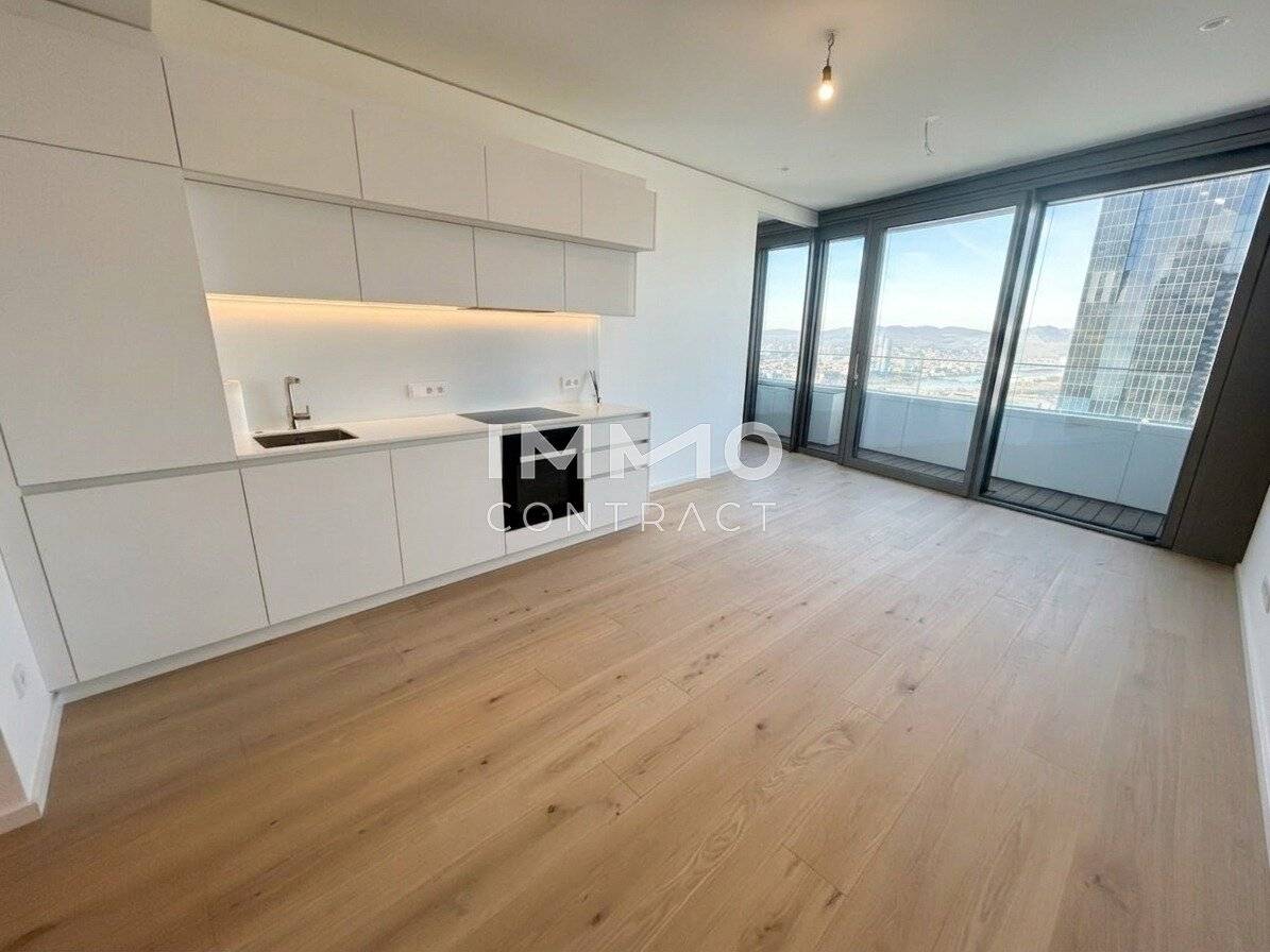 First-class 2 room apartment on the 43rd floor First occupancy incl. Doorman Gym Sauna Pool Bar