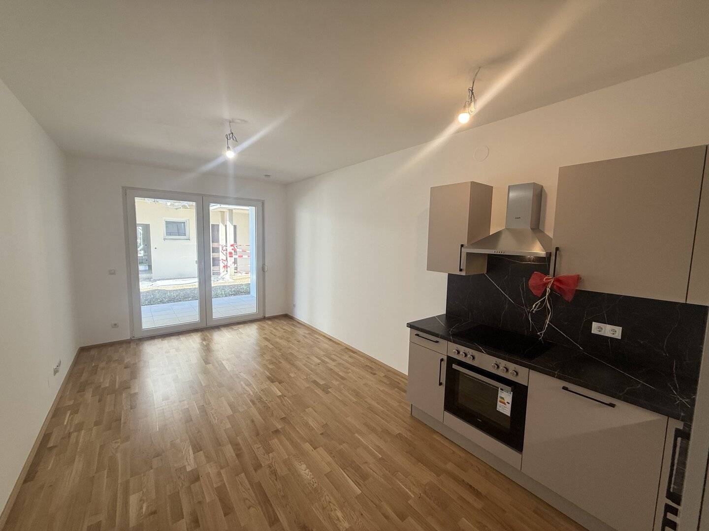 ERDGESCHOSS | 57M2 | 19M2 GARTEN | 2 TG- PARKPLÄTZE | 2 SCHLAFZIMMER | 16M2 TERRASSE