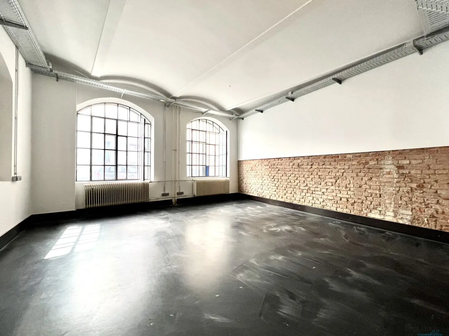 Modern loft office in historic Silk Factory – unique brick charm & high-quality fittings