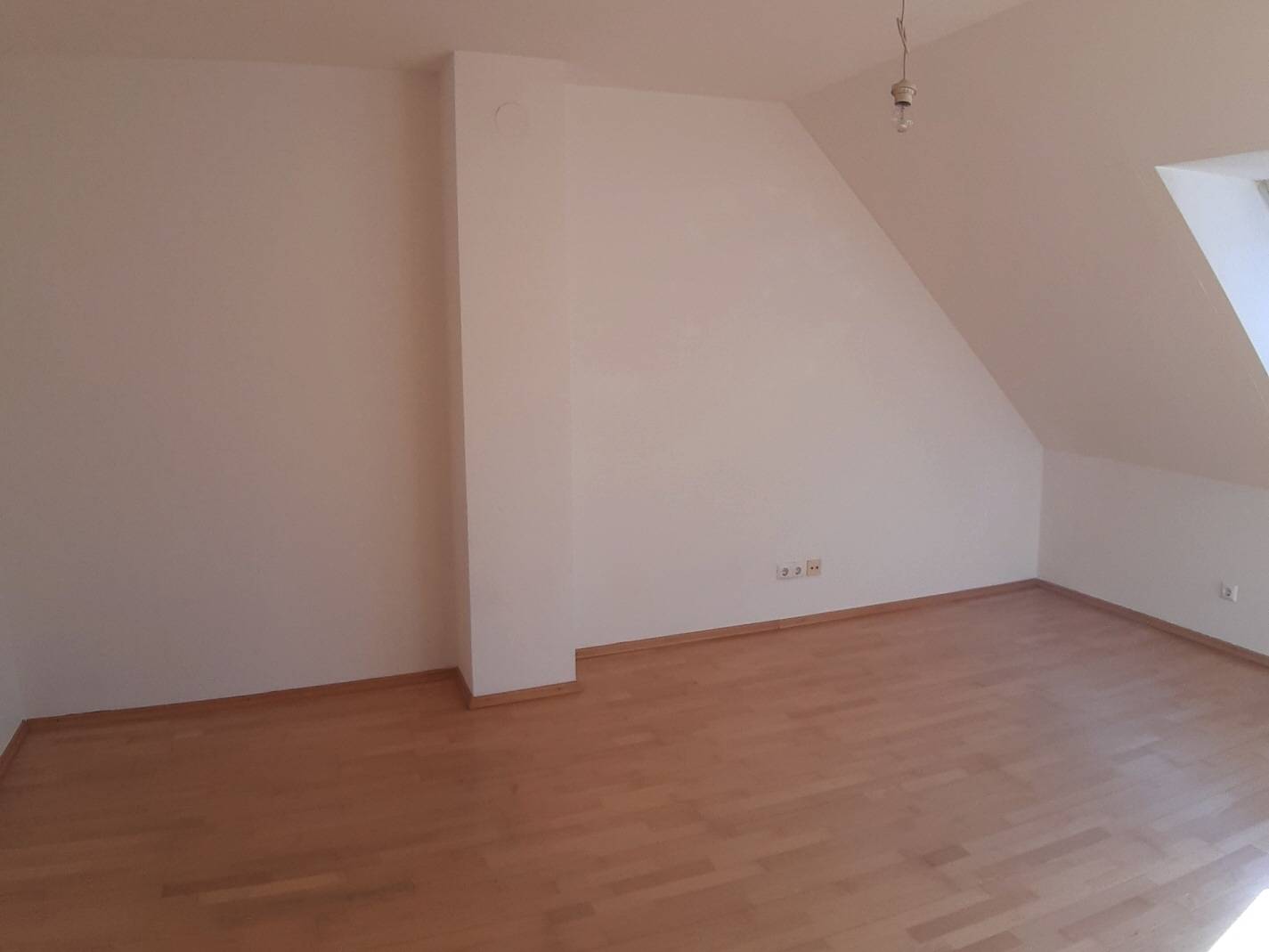 Bright attic apartment in a new building with communal garden