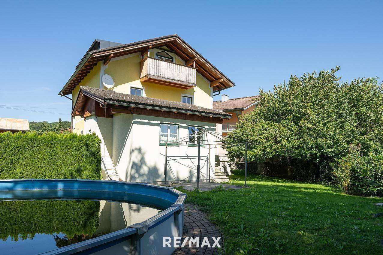 Familienwohnung mit Pool Garage und sonnigem Garten