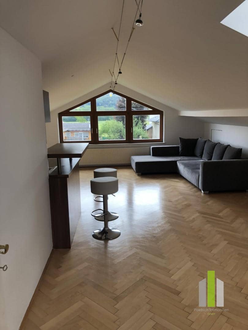 Bright attic apartment in peaceful garden setting