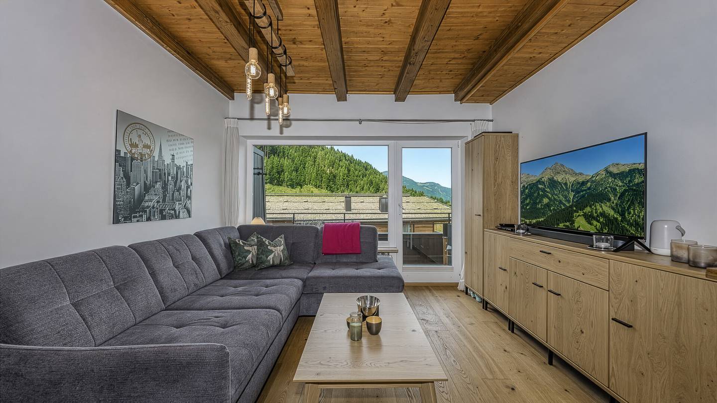Dachgeschosswohnung direkt an der Skipiste mit Kaiserblick