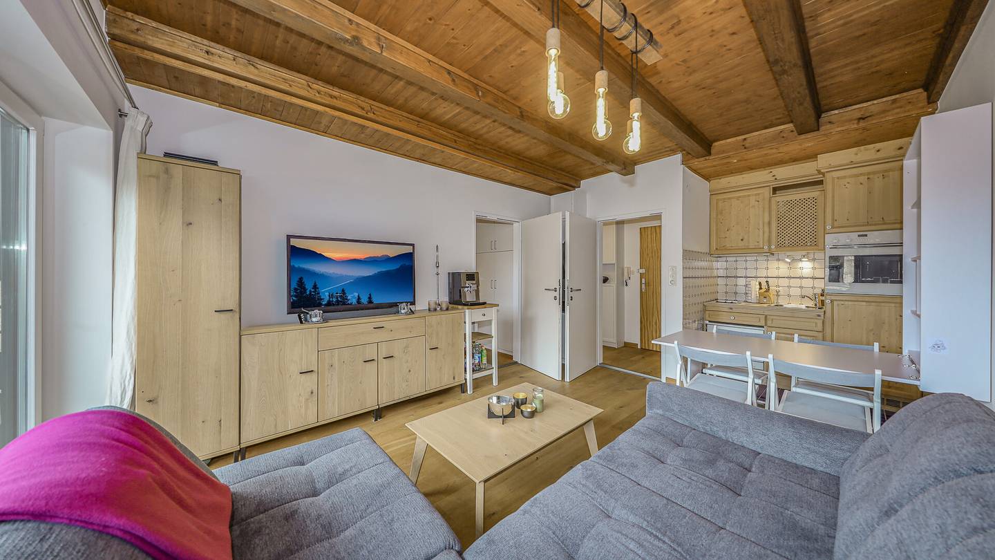 Dachgeschosswohnung direkt an der Skipiste mit Kaiserblick