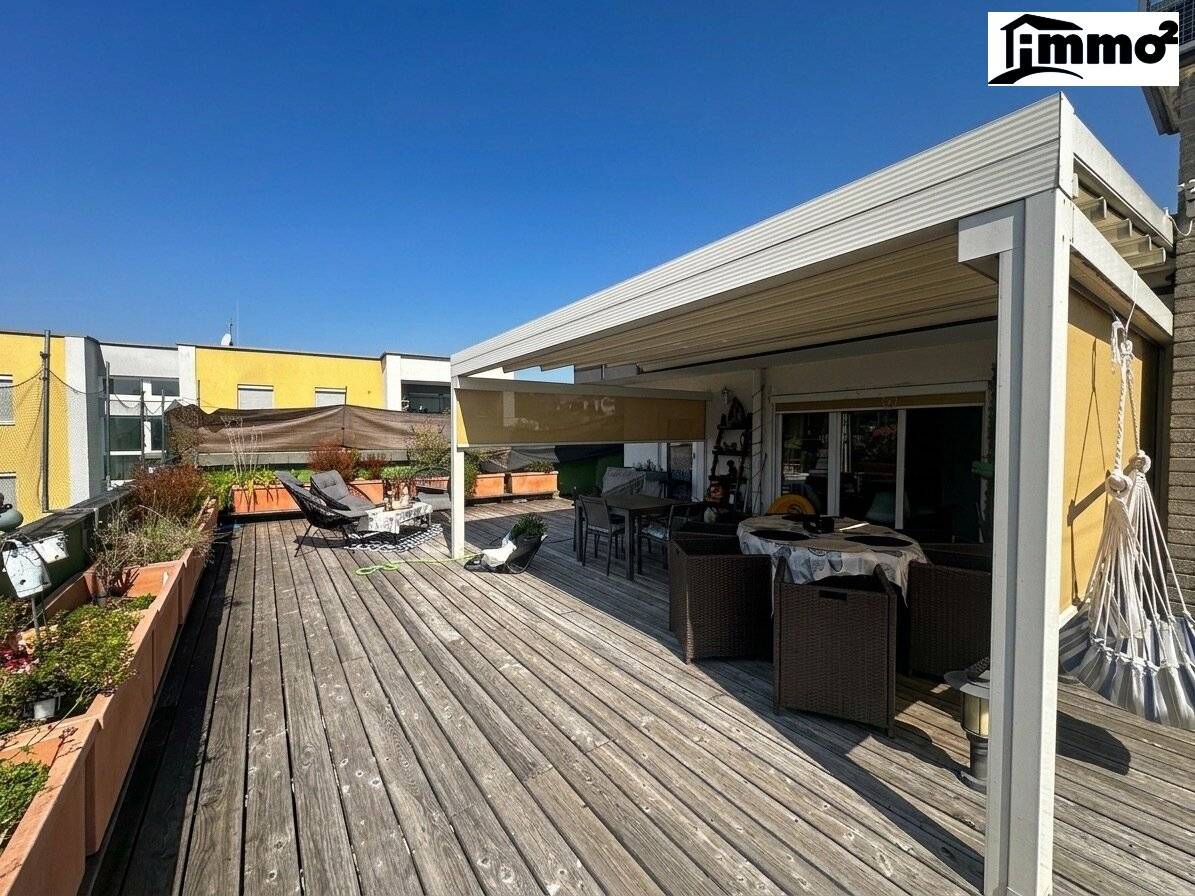 Delightful small penthouse apartment with approx.100 m² roof terrace and unique distant view in prime location Völkendorf
