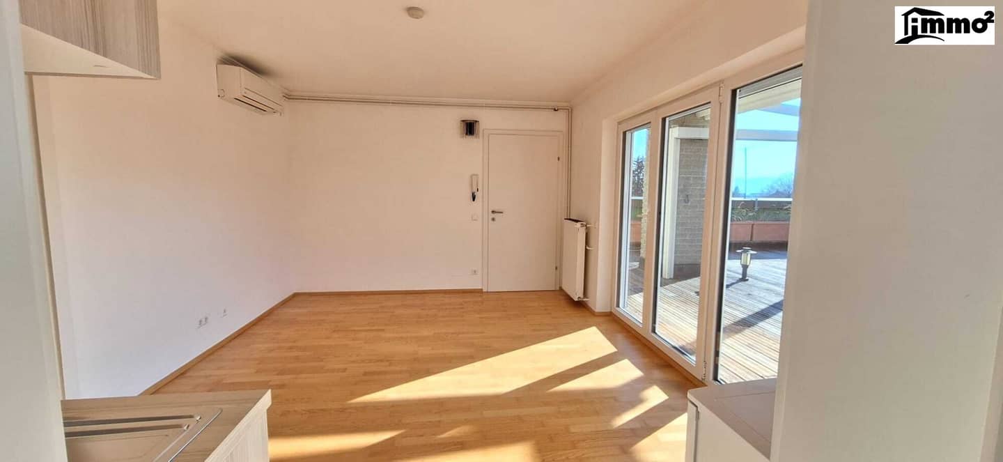 Delightful small penthouse apartment with approx.100 m² roof terrace and unique distant view in prime location Völkendorf