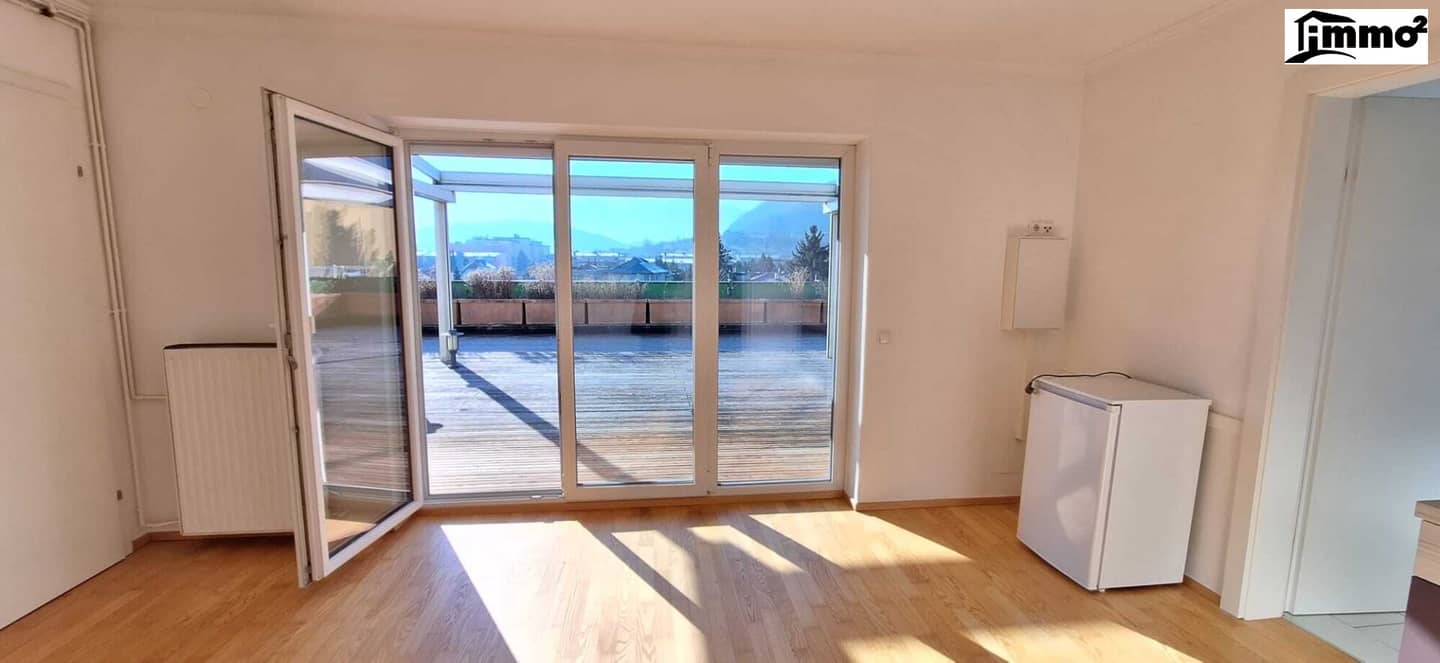 Delightful small penthouse apartment with approx.100 m² roof terrace and unique distant view in prime location Völkendorf