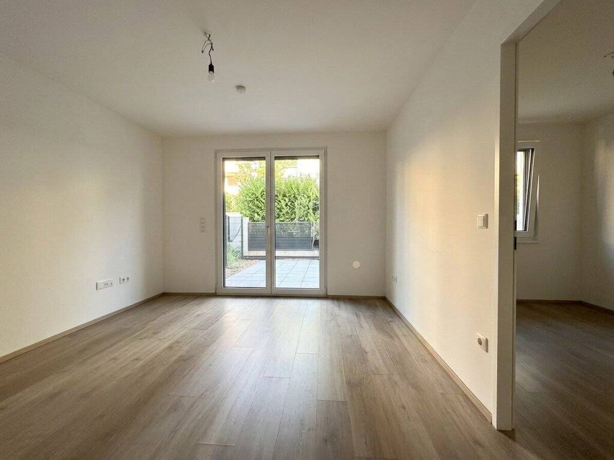 Wohn-Essbereich mit direktem Zugang zu Terrasse & Garten