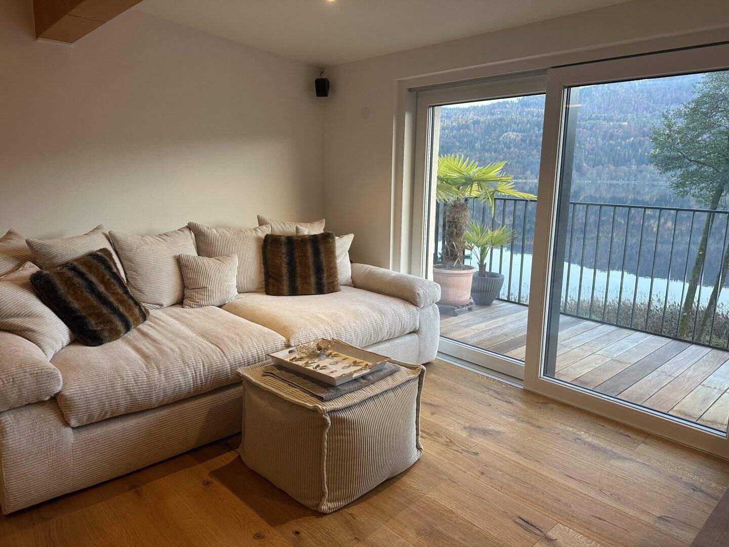 Exclusive penthouse with separate studio and generous outdoor spaces with lake view