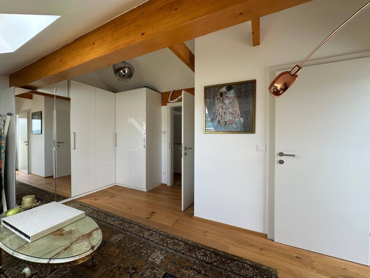 Exclusive penthouse with separate studio and generous outdoor spaces with lake view