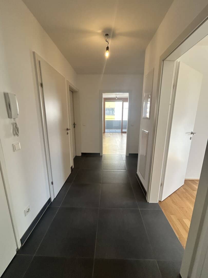Modern 2-room terrace apartment in Lenzing, like new, balcony, underfloor heating, only 490€ cold rent