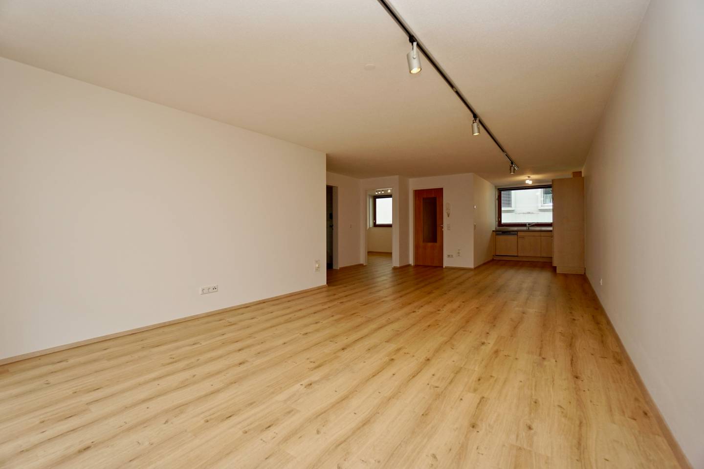 Bright generous apartment with balcony and underground parking