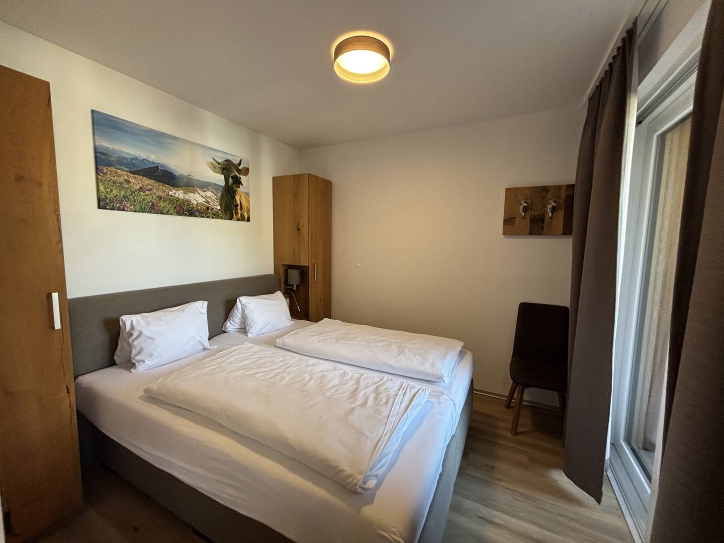 Anlegerwohnung im Chaletstil mit Loggia und Bergblick