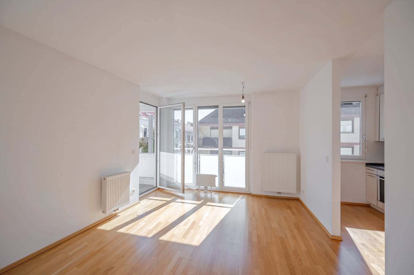 2-room new build apartment with balcony and underground parking space in prime location