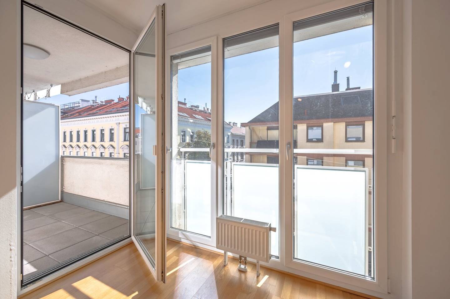 2-room new build apartment with balcony and underground parking space in prime location