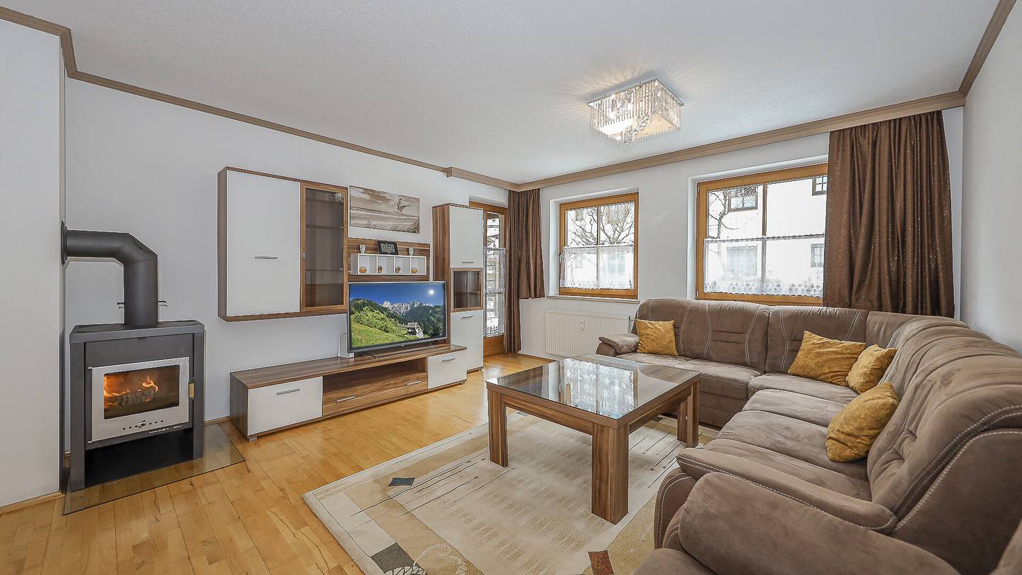 Bright ground floor apartment with private garden and underground parking