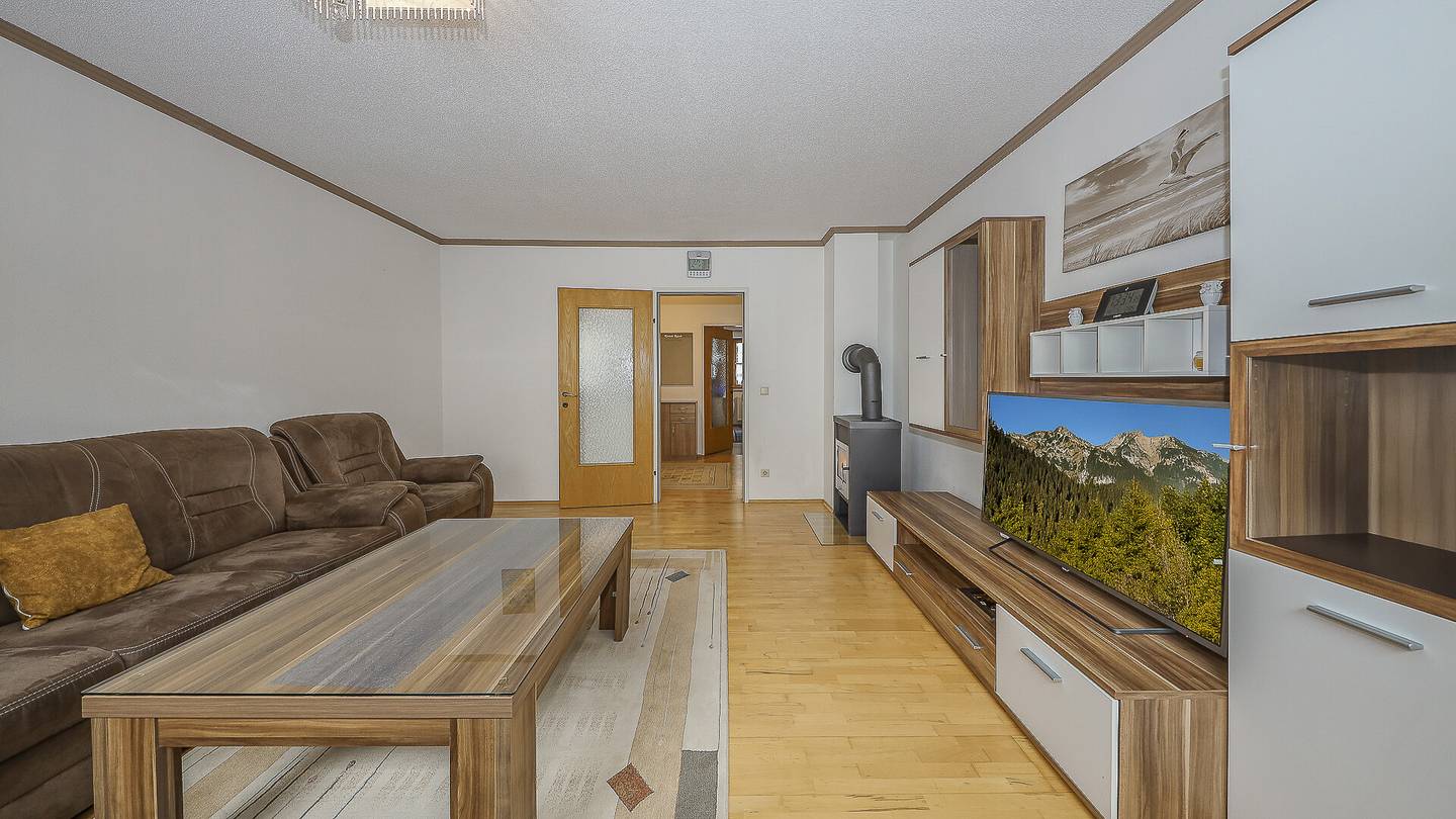 Bright ground floor apartment with private garden and underground parking