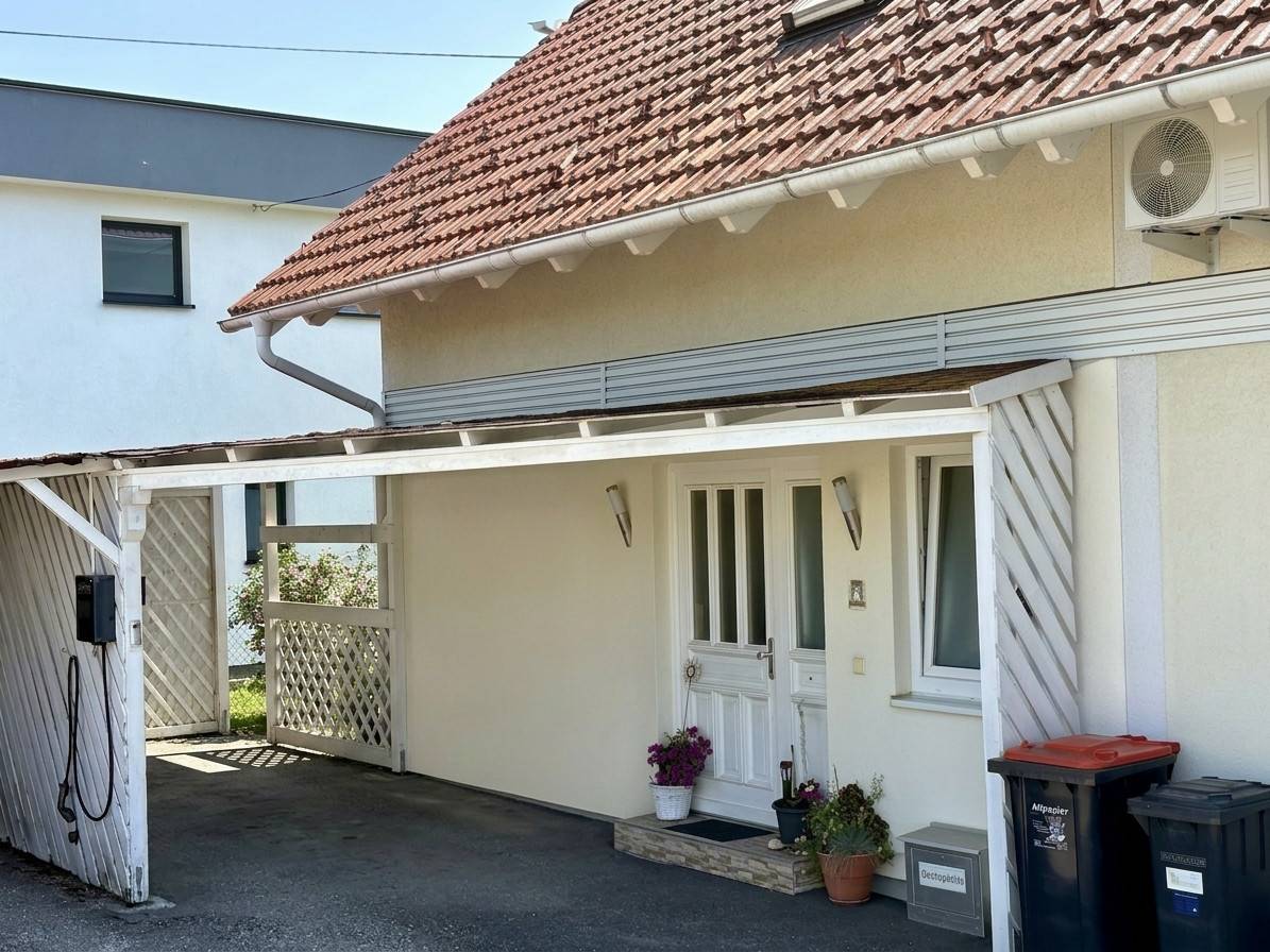 Sonnige Terrasse und Garten Familienwohnung in Aussichtslage