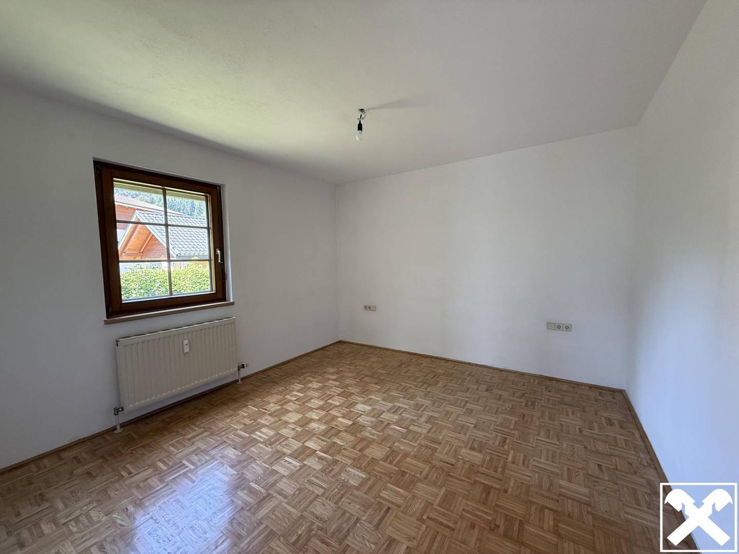 Wohnung mit großem Privatgarten und Bergblick