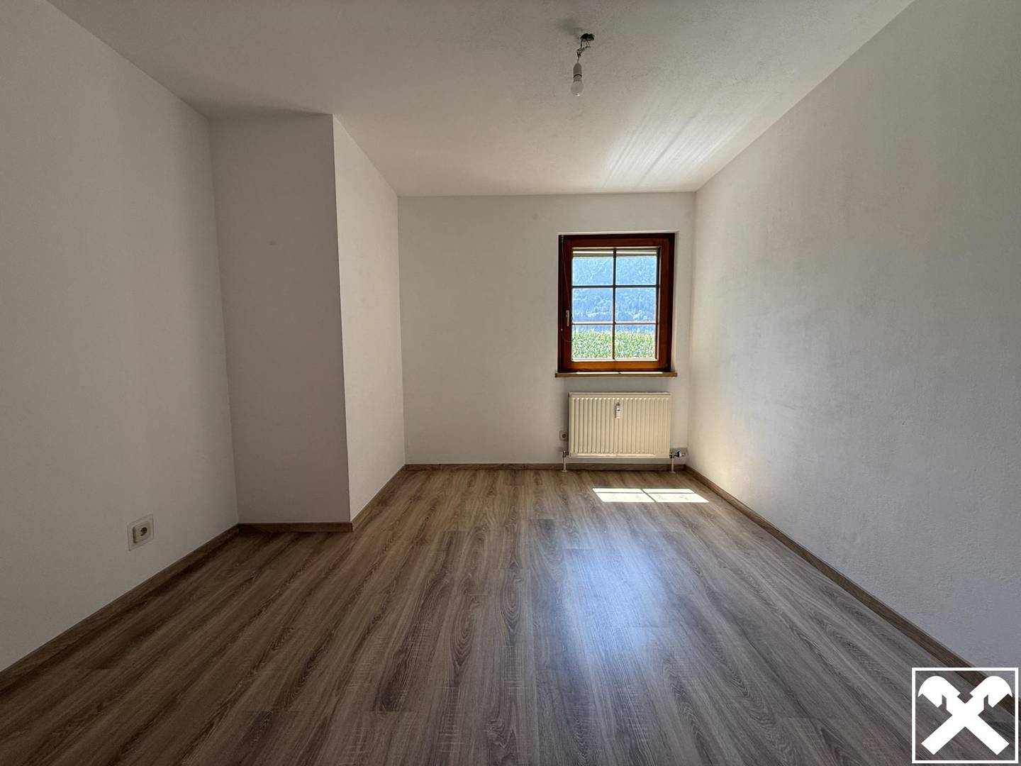 Wohnung mit großem Privatgarten und Bergblick