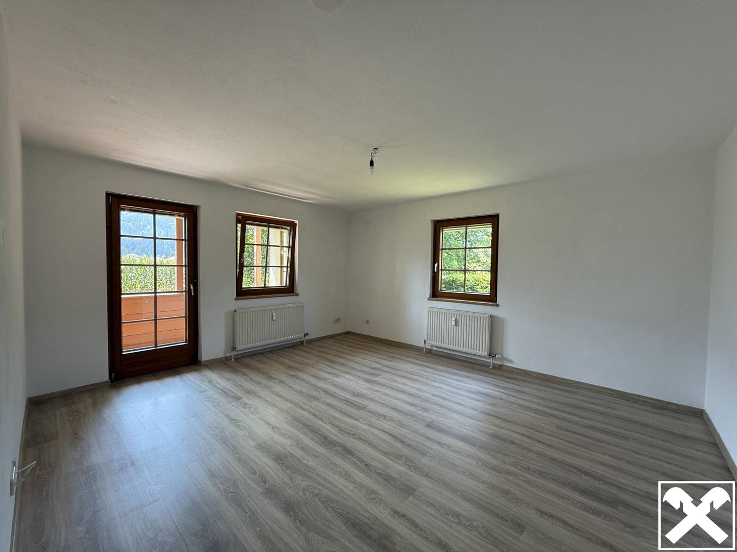 Wohnung mit großem Privatgarten und Bergblick