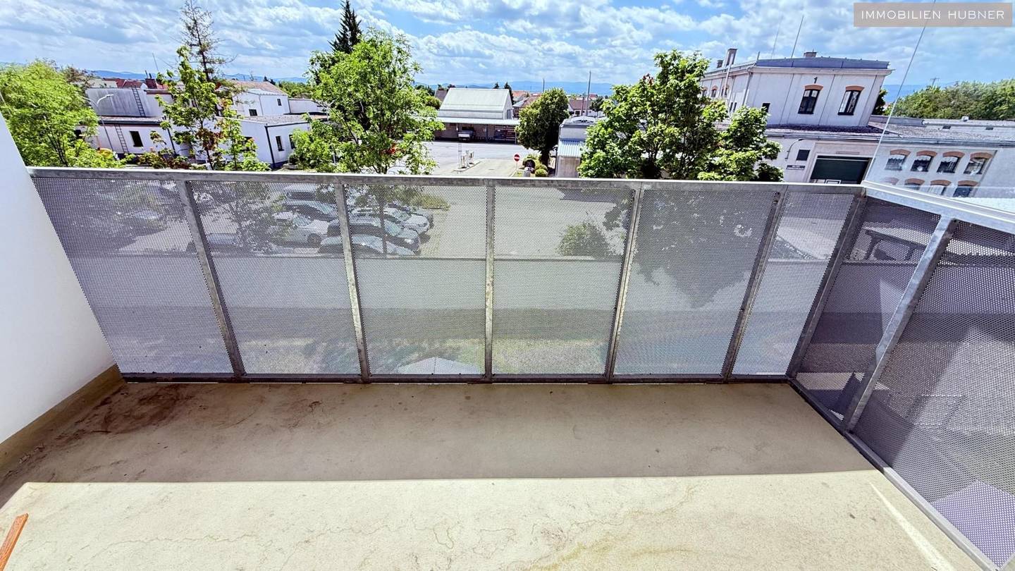 Lichtdurchflutete Neubauwohnung nahe Akademiepark mit Westloggia