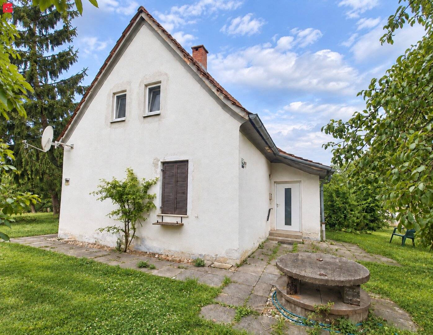 In need of renovation with orchard and well near Fürstenfeld