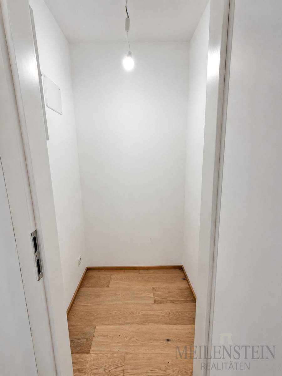 Refurbished apartment with covered balcony and green view