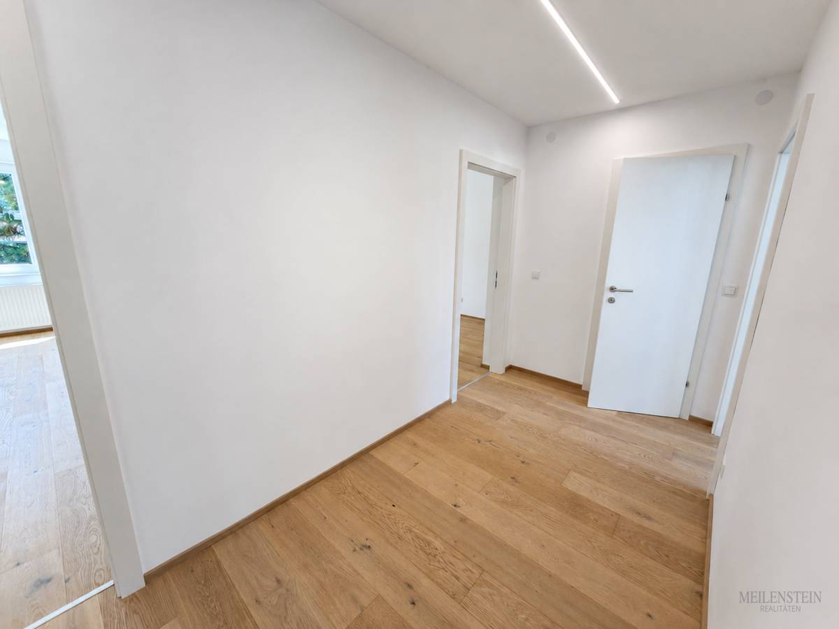 Refurbished apartment with covered balcony and green view
