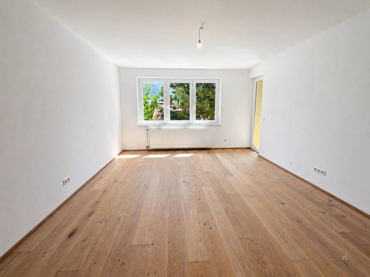 Hochwertig sanierte Wohnung mit überdachtem Balkon und Grünblick