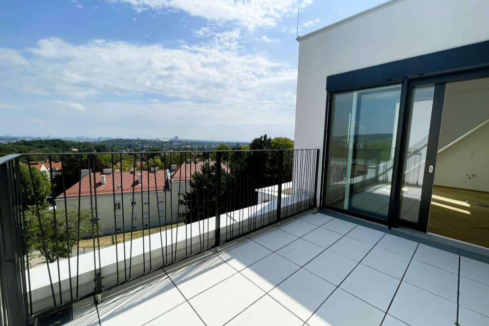 Lichtdurchflutete Maisonettewohnung mit Terrasse und Fernblick
