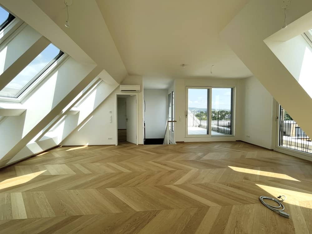 Lichtdurchflutete Maisonettewohnung mit Terrasse und Fernblick