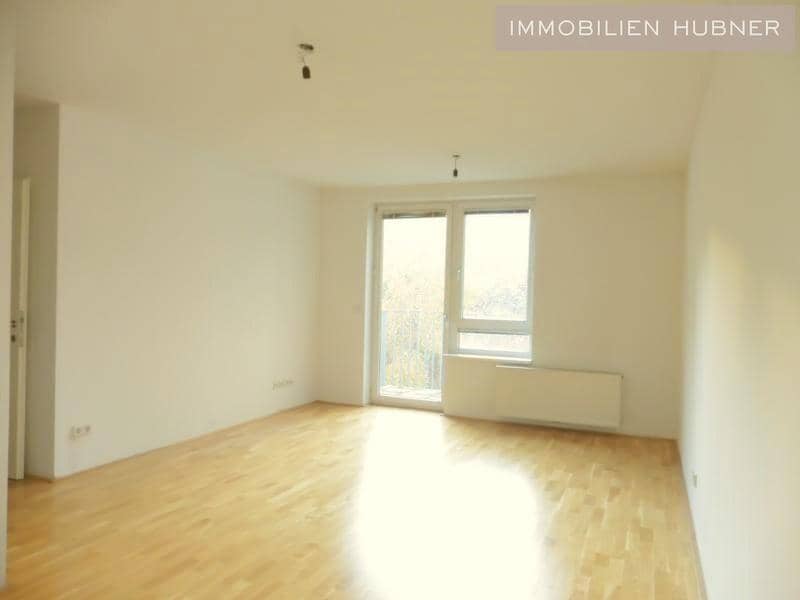 Lichtdurchflutete Neubauwohnung mit Westbalkon und Aufzug